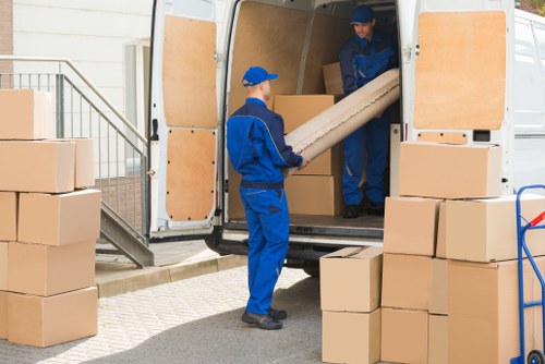 Removal van and packed boxes for a home move in Barnescray