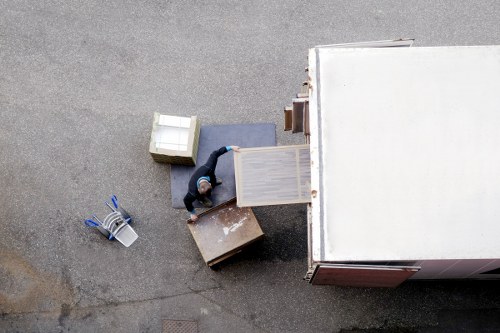 Removal van and movers on a residential street in Barnescray