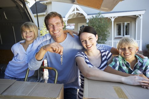 Family preparing belongings for a local move in Barnescray