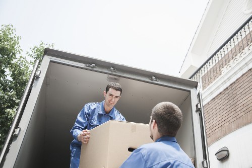 Furniture and boxes being unloaded at a Barnescray property