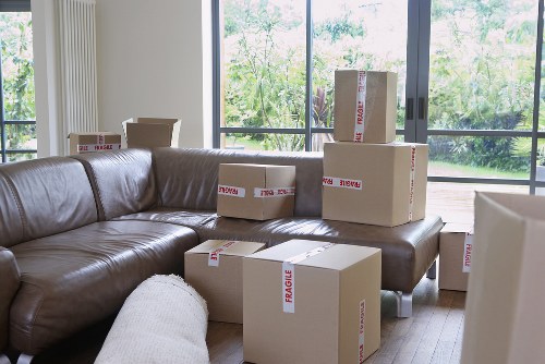 Local removals van loading furniture from a Barnescray property
