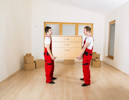 Local movers organizing labelled boxes during a Barnescray relocation